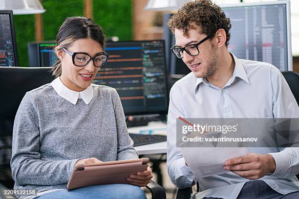 software programmers analyzing html code and database, brainstorming script ideas to develop new security system. engineers working with coding language collaborating on group project - data scientist stock pictures, royalty-free photos & images