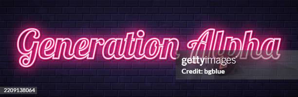 generation alpha - glowing neon text on brick wall background - roots background stock illustrations