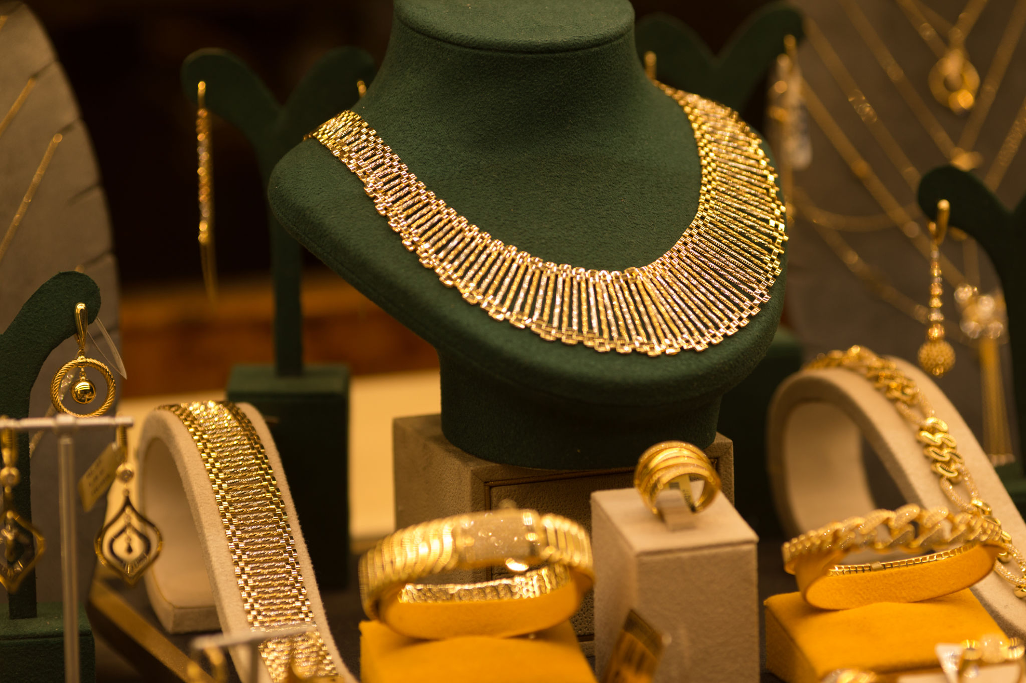 Jewelry and Gems Displayed in a Shop Window at Night Jewelry and Gems Displayed in a Shop Window at Night