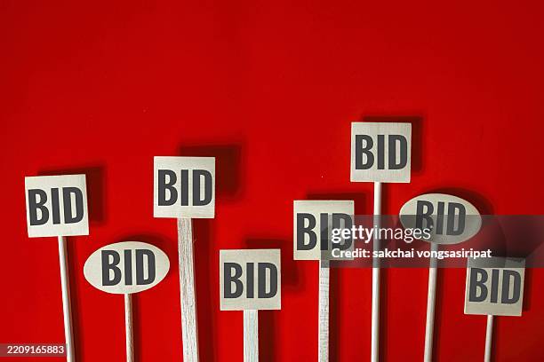 bidding auction signs - bid stock pictures, royalty-free photos & images