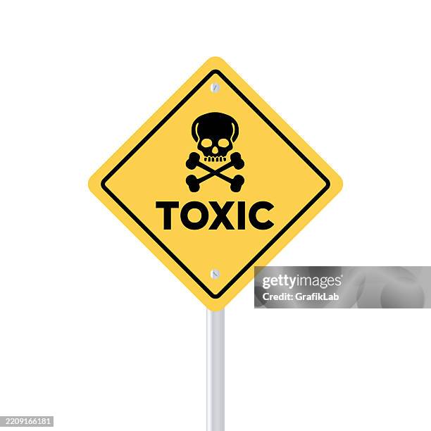 yellow warning sign indicating toxic substance skull crossbones - hazardous substances stock illustrations
