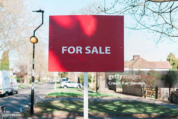 houses and gardens at sunrise, for sale sign - house for sale sign stock pictures, royalty-free photos & images
