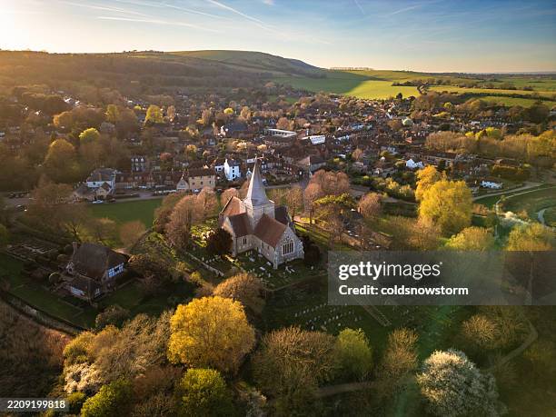 aerial view of alfriston village at sunset in east sussex, uk - norman style stock pictures, royalty-free photos & images