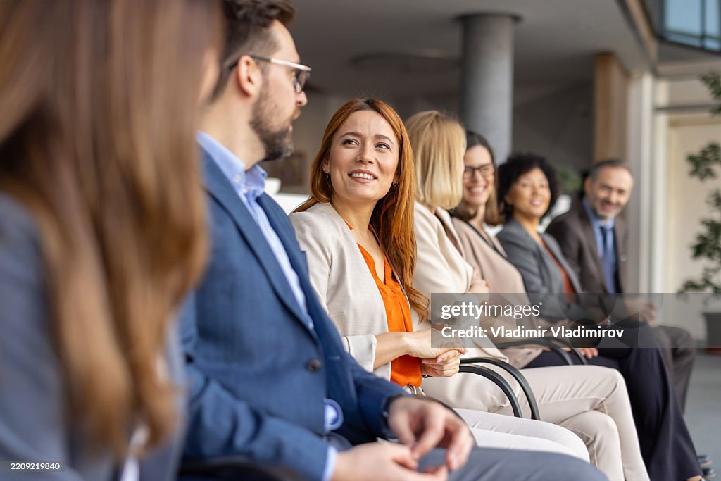Engaged and Smiling Audience in a Creative Setting