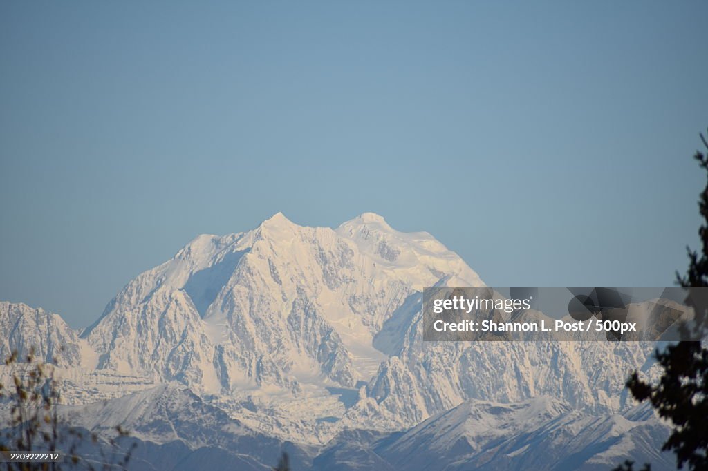Mount Hunter,Also known as Begguya,Rises with its rugged,Snow-covered peaks under a clear sky,Talkeetna,Alaska,United States,USA