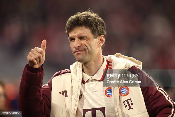 Thomas Mueller of Bayern Munich winks and gives a thumbs up prior to the UEFA Champions League 2024/25 Quarter Final First Leg match between FC...