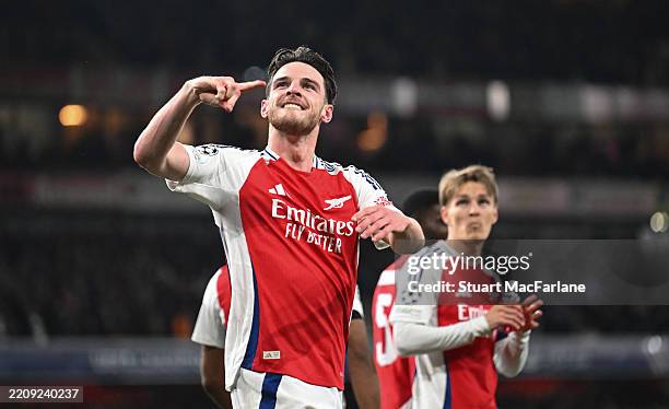 Declan Rice of Arsenal celebrates scoring his team's second goal during the UEFA Champions League 2024/25 Quarter Final First Leg match between...