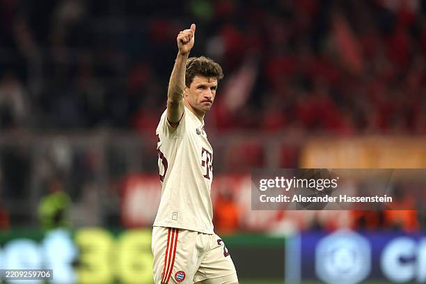 Thomas Mueller of Bayern Munich acknowledges the fans after defeat in the UEFA Champions League 2024/25 Quarter Final First Leg match between FC...