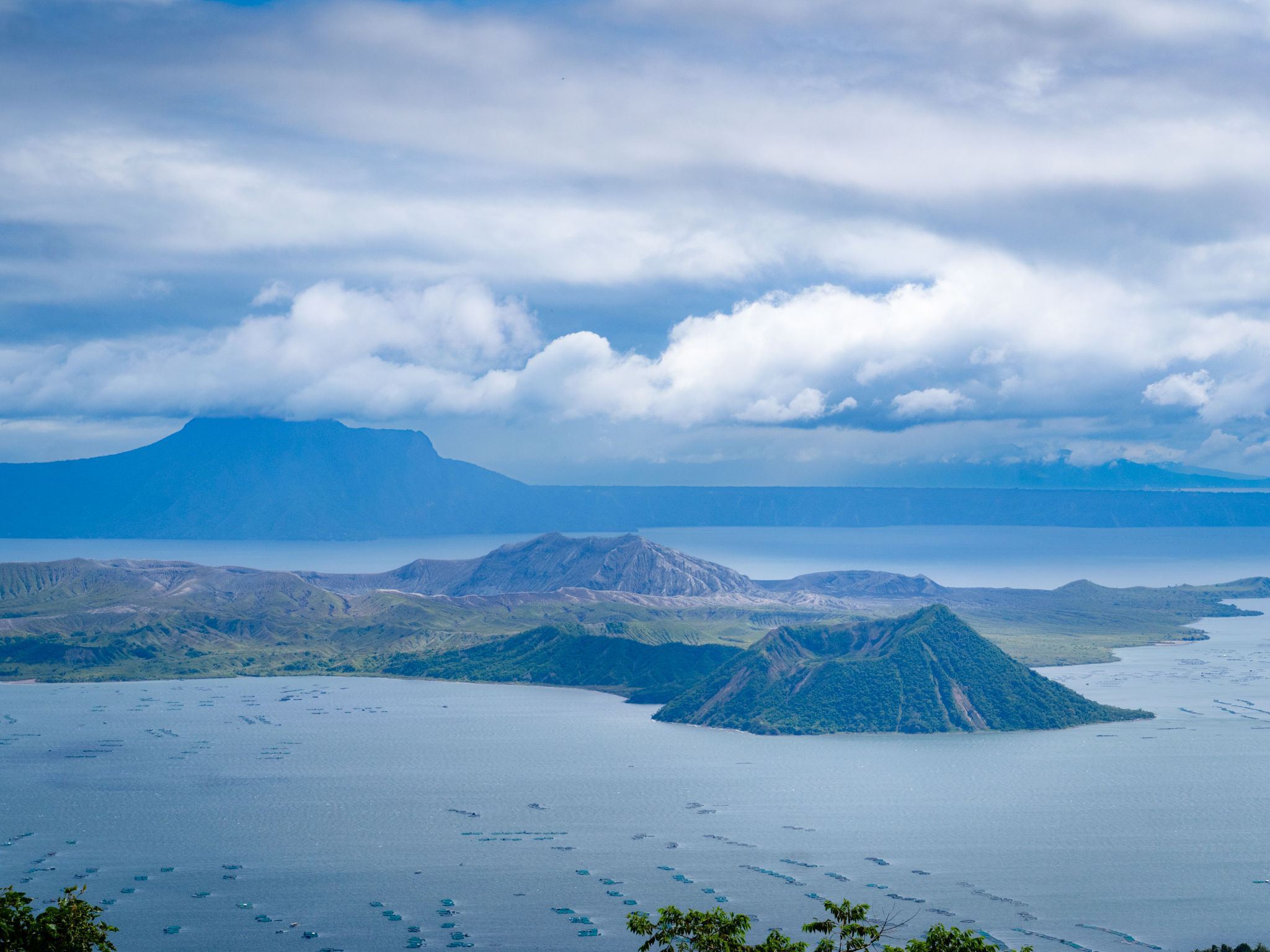 Breathtaking view of clouds over Taal Volcano and Lake in Batangas, Philippines Breathtaking view of clouds over Taal Volcano and Lake in Batangas, Philippines