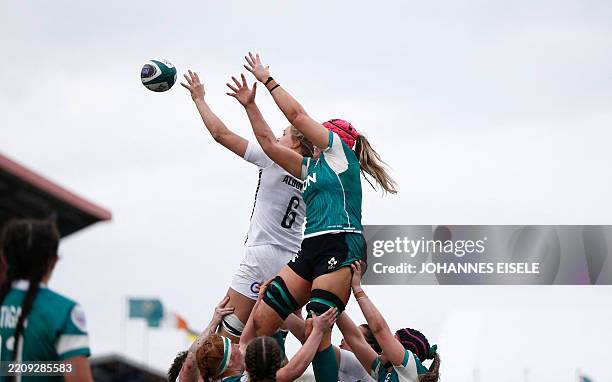 Ireland's flanker Brittany Hogan and England's flanker Zoe Aldcroft compete for line-out ball during the Six Nations international women's rugby...