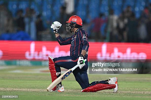 Karachi Kings' Abbas Afridi celebrates after wining the Pakistan Super League Twenty20 cricket match between Karachi Kings and Multan Sultan at the...