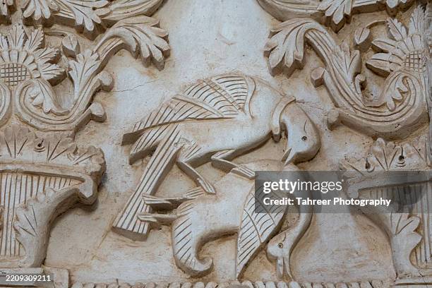 sculpture of a bird killing another bird - famine memorial stock pictures, royalty-free photos & images