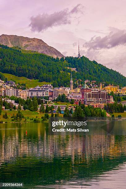 beautiful cityscape and alpine lake sankt moritz with mountain view in the swiss alps in a sunny summer day in st moritz - st moritz stock pictures, royalty-free photos & images
