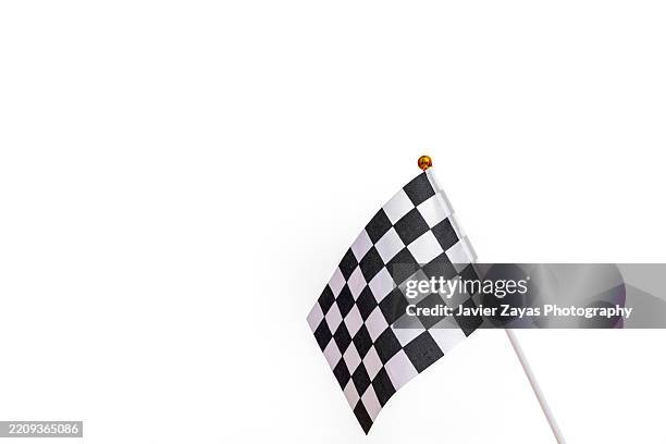 checkered flag waving on white background representing success - chequered flag stock pictures, royalty-free photos & images