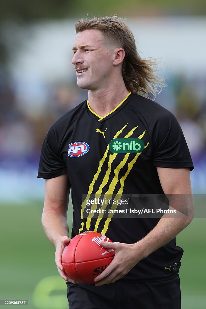 Hugo Ralphsmith Hugo Ralphsmith of the Tigers warms up during the 2025 AFL Round 05 ...