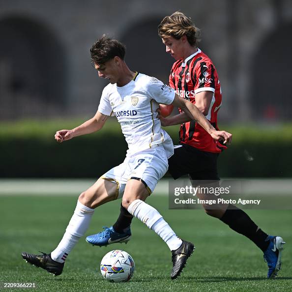 Comotto Christian Comotto of AC Milan competes for the ball with Diego... News ...