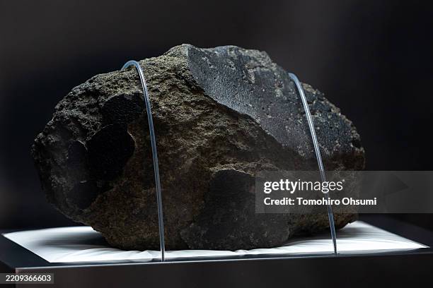 Meteorite from Mars is displayed in the Japan Pavilion during the media day held ahead of the Expo 2025 Osaka, Kansai, Japan on April 09, 2025 in...