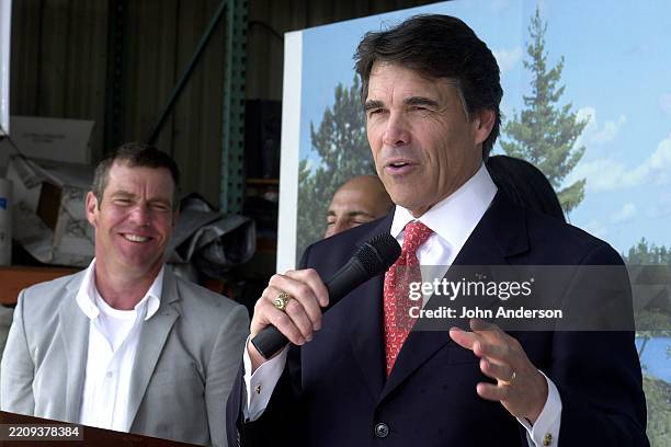 Texas Governor Rick Perry speaks during a signing ceremony for House Bill 873 at Austin Studios, Austin, Texas, June 7, 2007. Visible behind him are,...