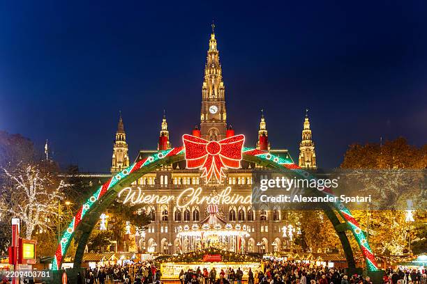christmas market by the city hall in vienna, austria - julmarknad bildbanksfoton och bilder