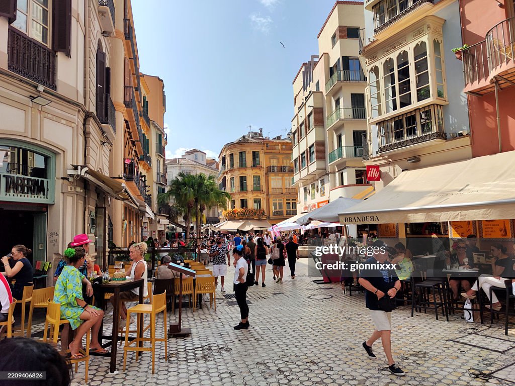 People walking in Plaza del Carbon, Malaga, Andalusia
