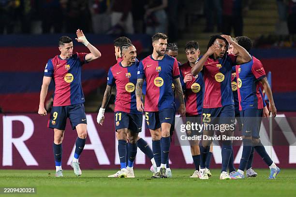 Robert Lewandowski of FC Barcelona celebrates scoring his team's third goal with teammates during the UEFA Champions League 2024/25 Quarter Final...