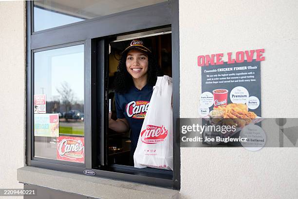 Azzi Fudd makes victory pit stop at Raising Cane's after their 2025 NCAA Women's Basketball National Championship win on April 09, 2025 in Enfield,...