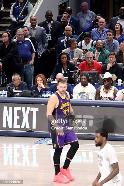 General Manager Nico Harrison of the Dallas Mavericks watches Luka Doncic of the Los Angeles Lakers on the court during the second quarter at...