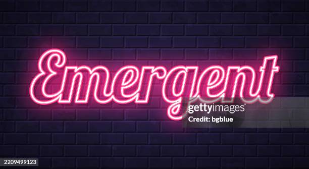 emergent - glowing neon text on brick wall background - break through wall stock illustrations