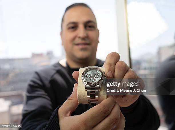 Asher Gamzo shows off a $120,000 Rolex platinum Daytona with baguette dials at his Gamzo and Co. In Los Angeles, CA. The luxury watch seller has been...