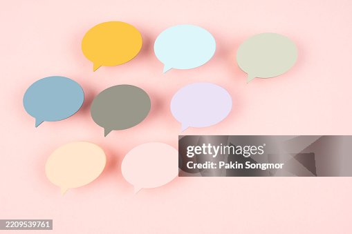 Blank multi color post it notes in the shape of speech bubble on pink color background. Blank multi color post it notes in the shape of speech bubble on pink color background.