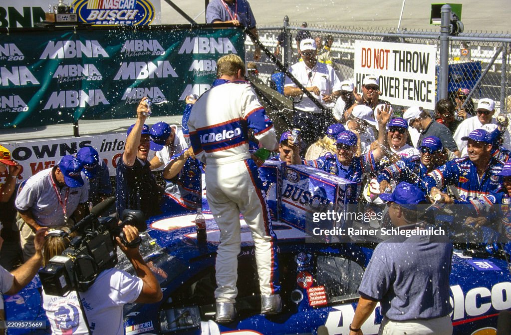 Mbna Racing Dale Earnhardt Jr stands in the window of his race winning Dale... News ...