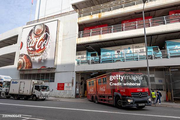 coca-cola bottling plant in hong kong - bottling plant stock pictures, royalty-free photos & images