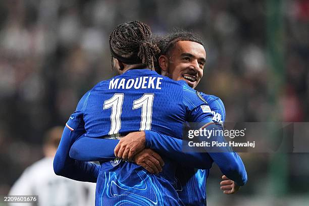 Noni Madueke of Chelsea celebrates scoring his team's second goal with teammate Trevoh Chalobah during the UEFA Conference League 2024/25 Quarter...
