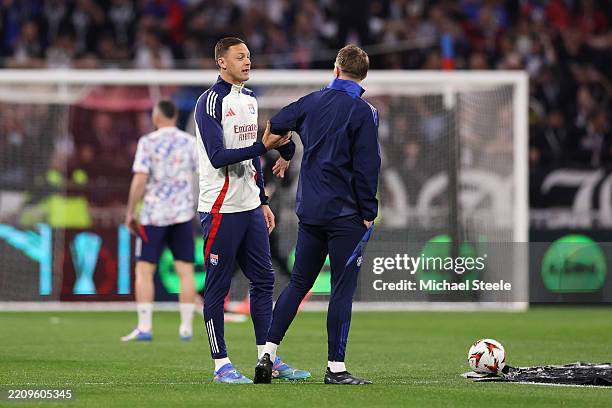 Nemanja Matic of Olympique Lyonnais speaks to Darren Fletcher, First Team Coach of Manchester United, during the warm up prior to the UEFA Europa...