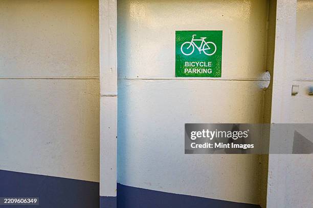 kingston to edmonds 'spokane' ferry on puget sound, a doorway with a sign, bicycle parking - bicycle parking sign stock pictures, royalty-free photos & images