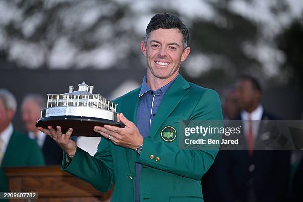 Rory McIlroy of Northern Ireland holds the trophy after the final round of Masters Tournament at Augusta National Golf Club on April 13, 2025 in...