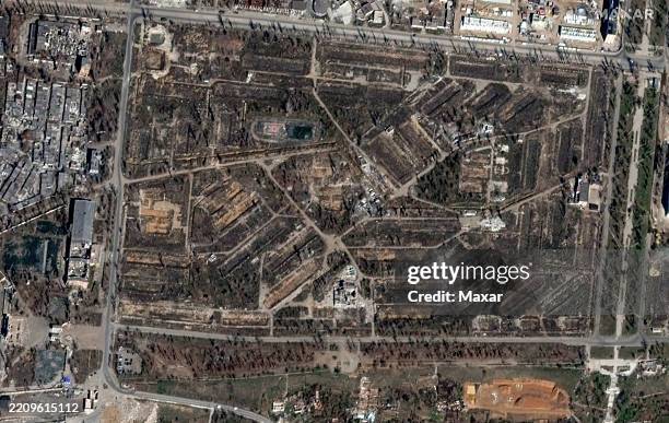Maxar satellite imagery of an entire complex of apartment buildings near Park Leoprs'koho Mariupol, Ukraine. Please use: Satellite image 2025 Maxar...