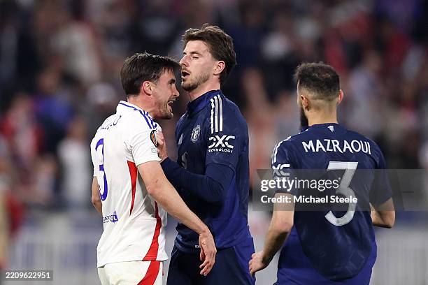 Nicolas Tagliafico of Olympique Lyonnais clashes with Mason Mount of Manchester United during the UEFA Europa League 2024/25 Quarter Final First Leg...