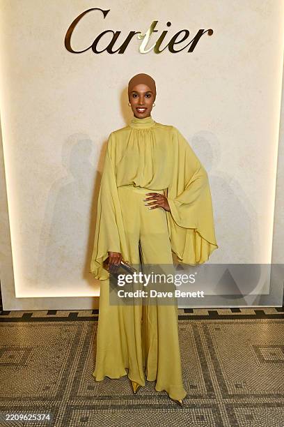 Ikram Abdi Omar attends 'CARTIER' exhibition VIP dinner at The V&A on April 10, 2025 in London, England.