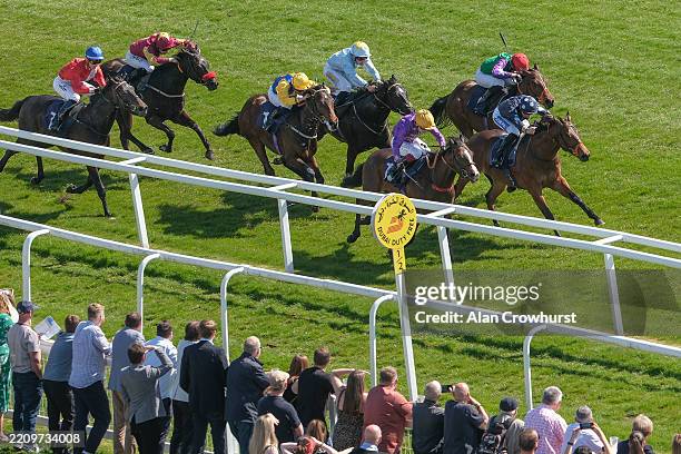 David Probert riding Inca Heights win The Dubai Duty Free Golf World Cup EBF Maiden Stakes at Newbury Racecourse on April 11, 2025 in Newbury,...