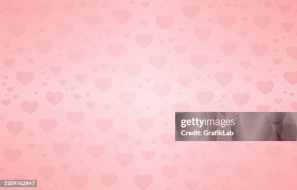 light pink background repeated heart motif; evokes romance, love, valentine's themes - good vibes stock illustrations