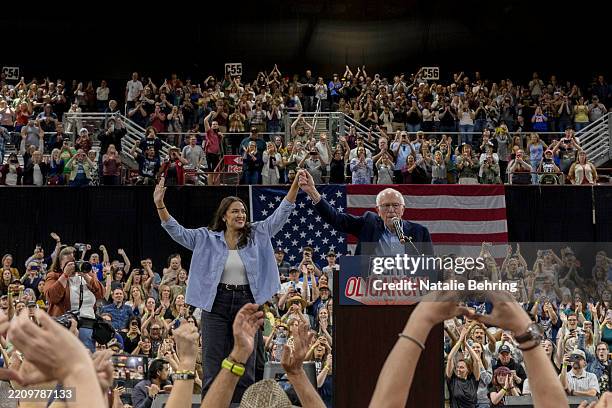 Rep. Alexandria Ocasio-Cortez and U.S. Sen. Bernie Sanders speak to a full auditorium as part of the "Fighting Oligarchy" tour on April 14, 2025 in...