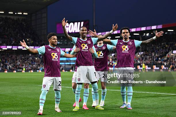 Jaidon Anthony of Burnley celebrates with Marcus Edwards and Lucas Pires after scoring their secon goal during the Sky Bet Championship match between...