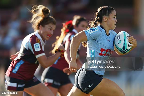 Desiree Miller of the Waratahs makes a break to score a try during the Super Rugby Women's Final match between NSW Waratahs and Queensland Reds at...