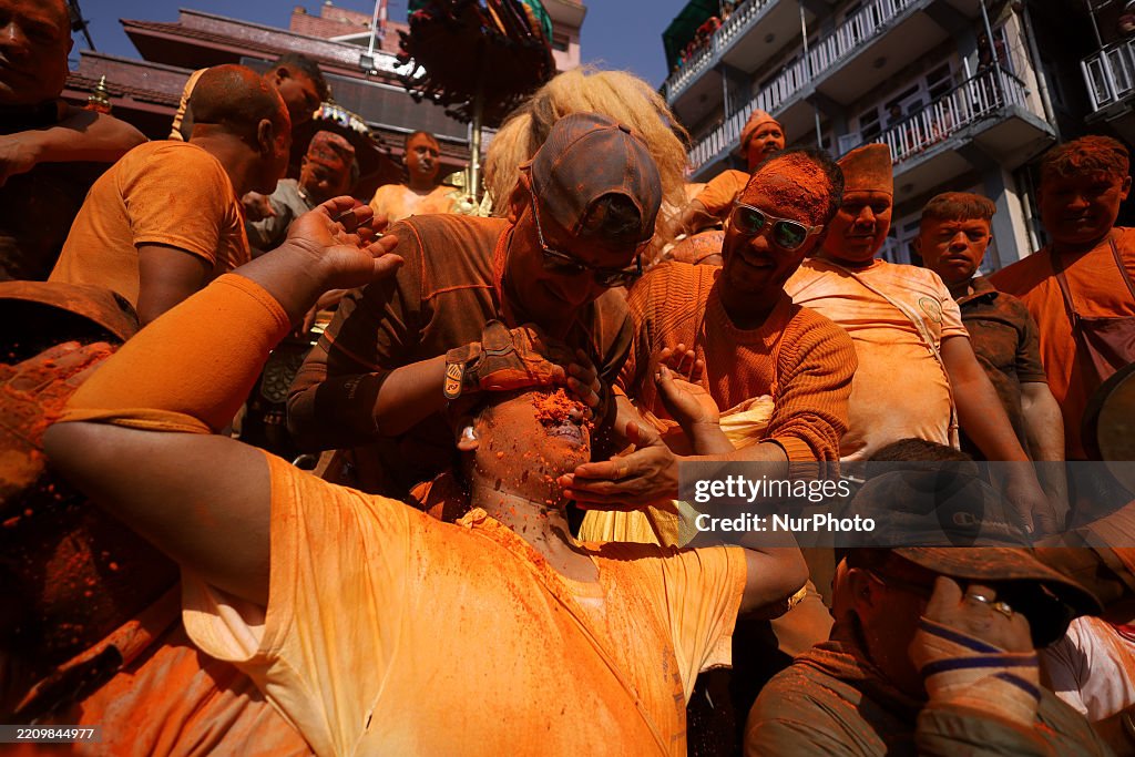 Vermilion Powder A Nepali reveler has his face smeared with vermillion powder during ...