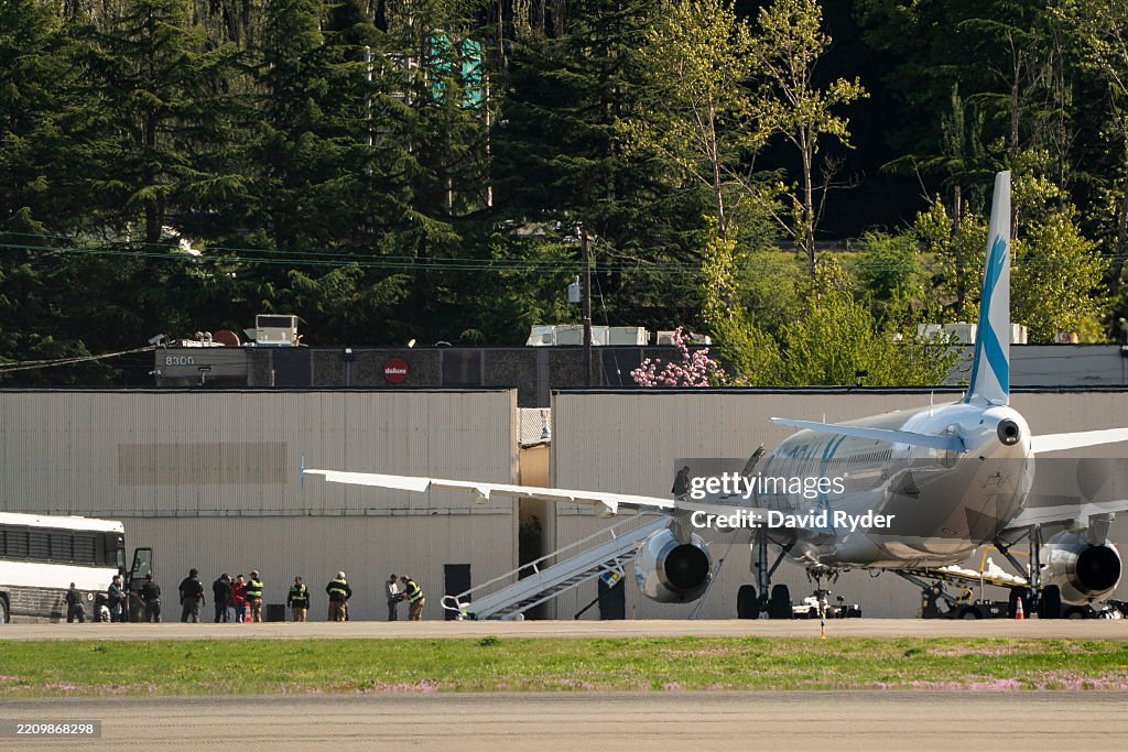 Detainees Are Loaded Onto ICE Flights At Seattle's King County International Airport