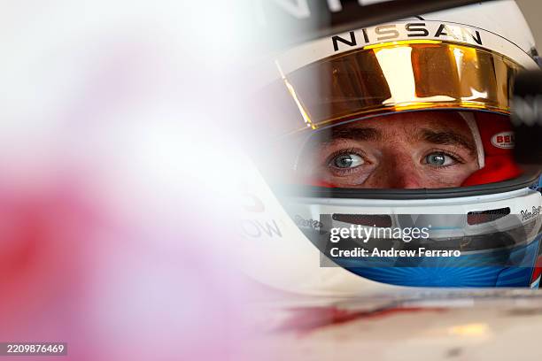 Oliver Rowland of Great Britain and Nissan Formula E Team looks on while in his car during practice ahead of the Miami E-Prix, Round 5 of the 2025...