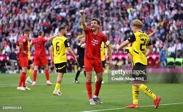 Thomas Mueller of Bayern Munich reacts during the Bundesliga match between FC Bayern München and Borussia Dortmund at Allianz Arena on April 12, 2025...