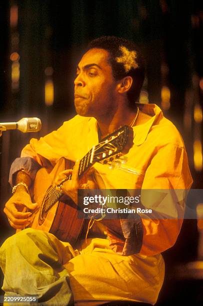 Gilberto Gil , Brazilian singer and guitarist, during a concert, September 1981.