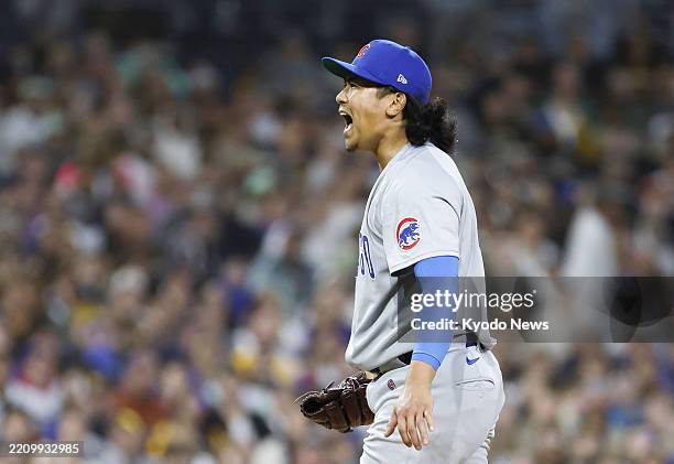 Chicago Cubs starter Shota Imanaga reacts after escaping a bases-loaded jam in the third inning of a baseball game against the San Diego Padres at...